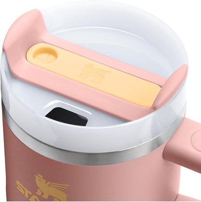 STANLEY Quencher H2.0 Tumbler with Handle and Straw 20 oz | Flowstate 3-Position Lid | Cup Holder Compatible for Travel | Insulated Stainless Steel Cup | BPA-Free | Peach Rose