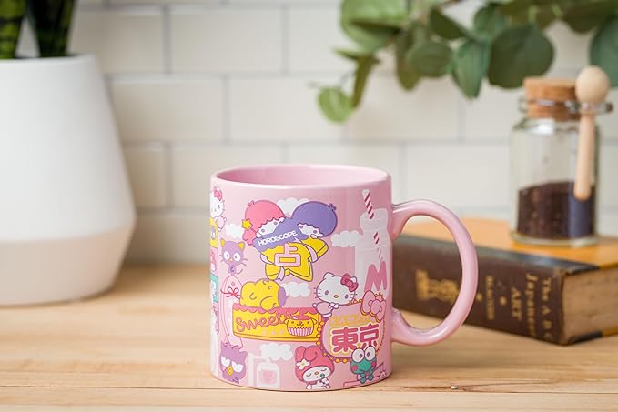 Silver Buffalo Sanrio Hello Kitty and Friends Kawaii Tokyo Theme Featuring Little Twin Stars, Chococat, My Melody, Keroppi, Badtz-Maru, and Pompompurin Ceramic Mug, 20 Ounces