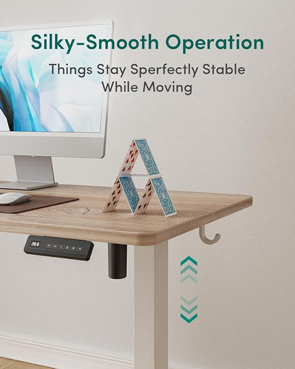 FEZIBO Standing Desk, 63×28 Inches Electric Height Adjustable, Sit Stand Up Table, Computer Office Desk with Splice Board, While Frame/Maple TOP